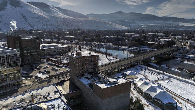 property's view of city with a mountain view