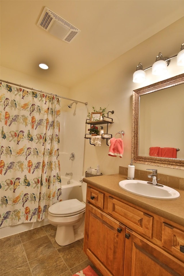 full bathroom with vanity, shower / bath combination with curtain, and toilet