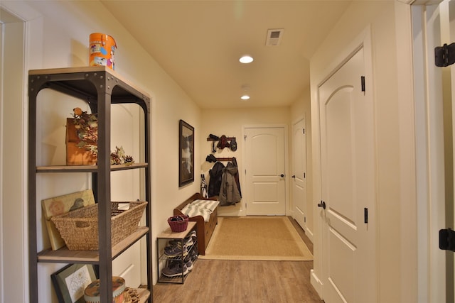 hall with light wood-type flooring