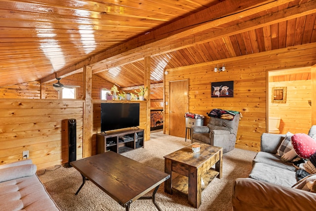 carpeted living room featuring wood ceiling, wooden walls, and lofted ceiling with beams