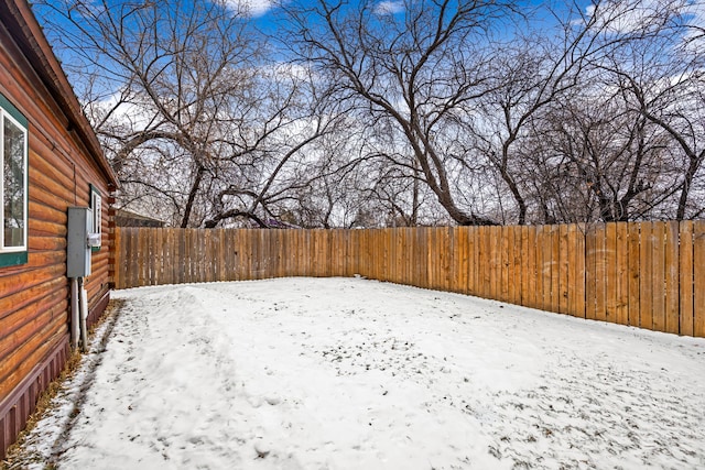 view of snowy yard