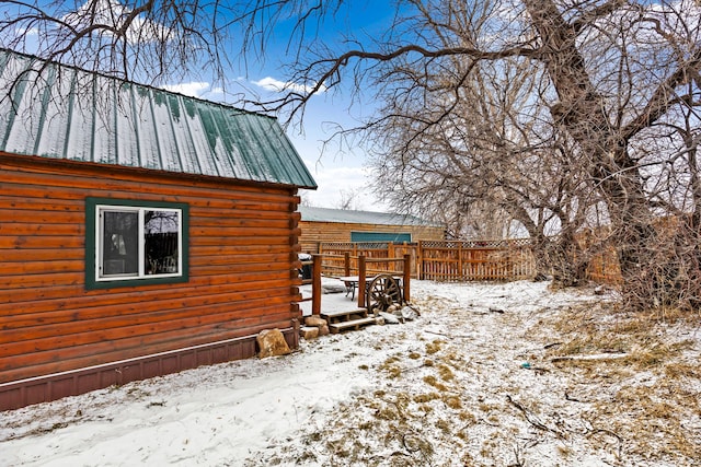 view of snow covered property