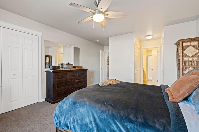 bedroom with ceiling fan, carpet flooring, and a closet