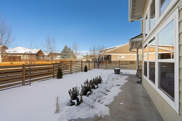 view of yard covered in snow