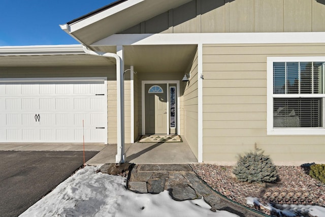 property entrance featuring a garage