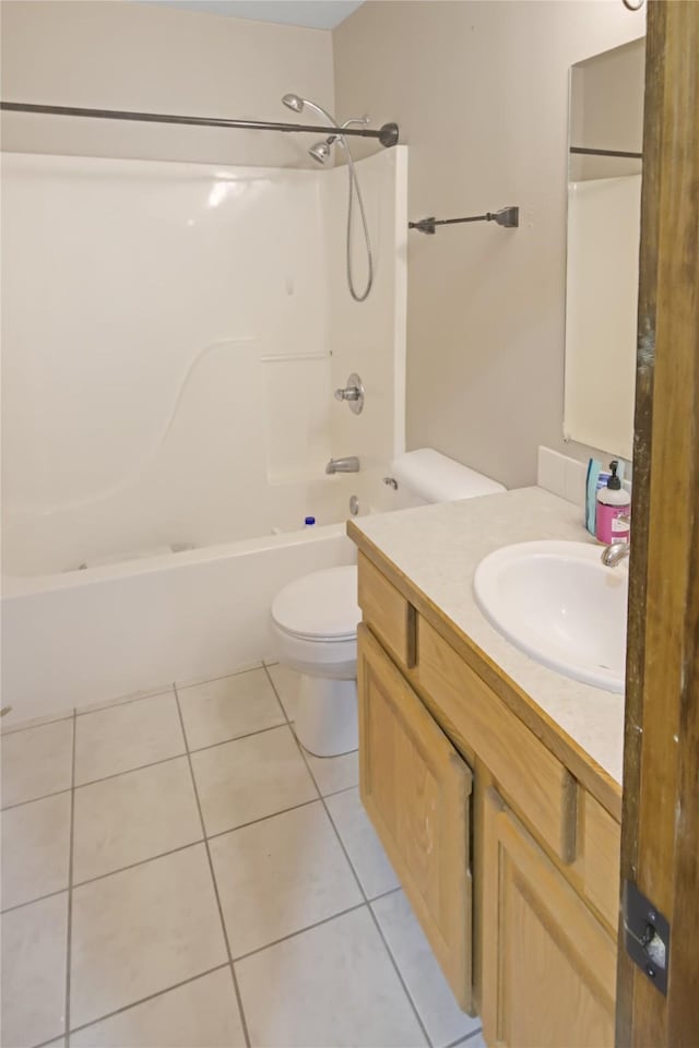 full bathroom with shower / washtub combination, toilet, tile patterned flooring, and vanity