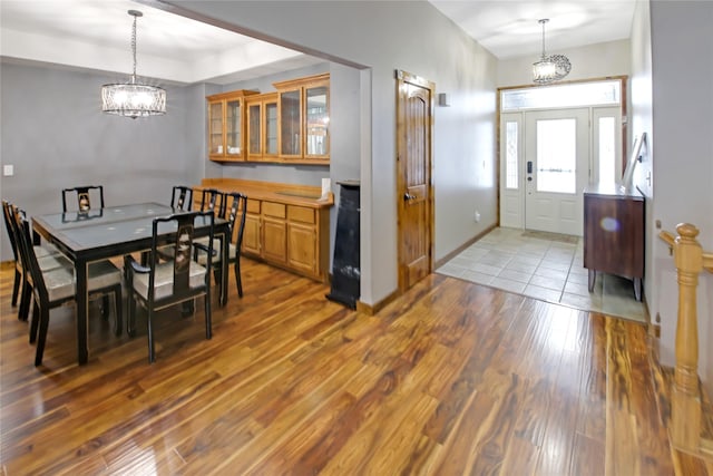 dining room featuring a chandelier and light hardwood / wood-style floors