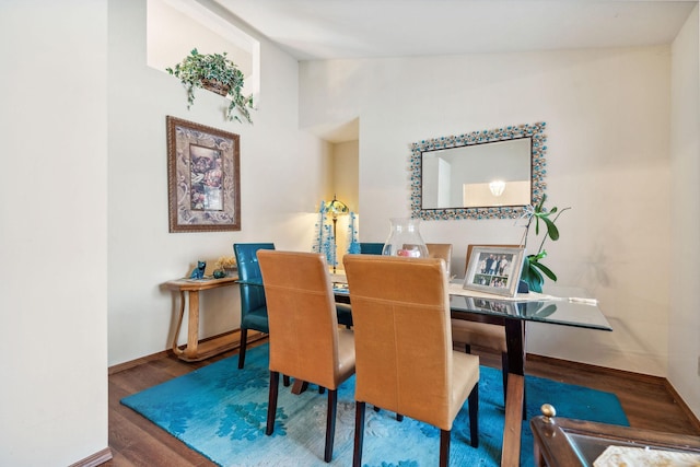 dining space featuring hardwood / wood-style floors