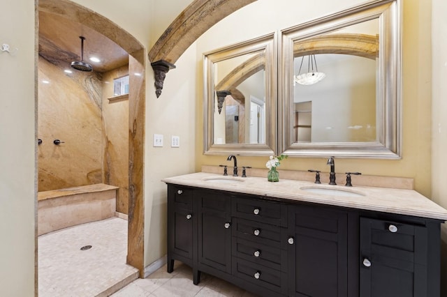 bathroom featuring vanity and walk in shower