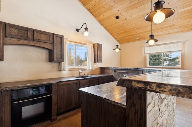 kitchen with black oven, sink, dark hardwood / wood-style flooring, hanging light fixtures, and wood ceiling