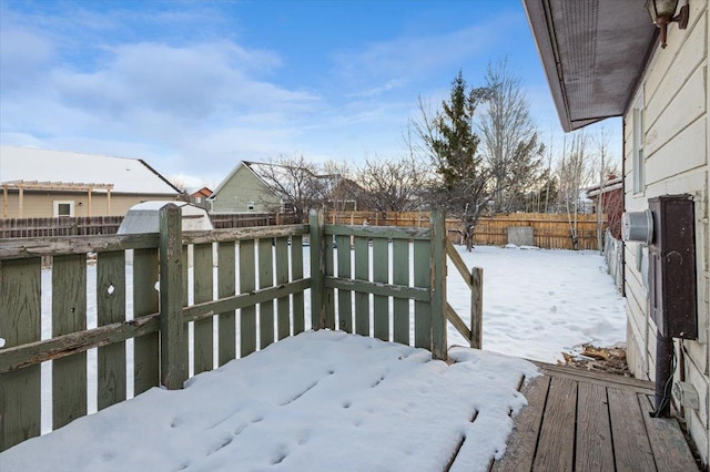 view of yard covered in snow