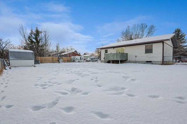 view of yard covered in snow