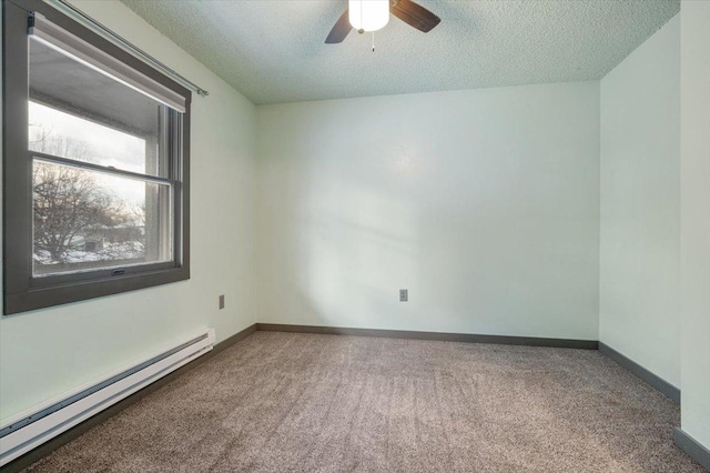 unfurnished room with carpet flooring, ceiling fan, a textured ceiling, and baseboard heating