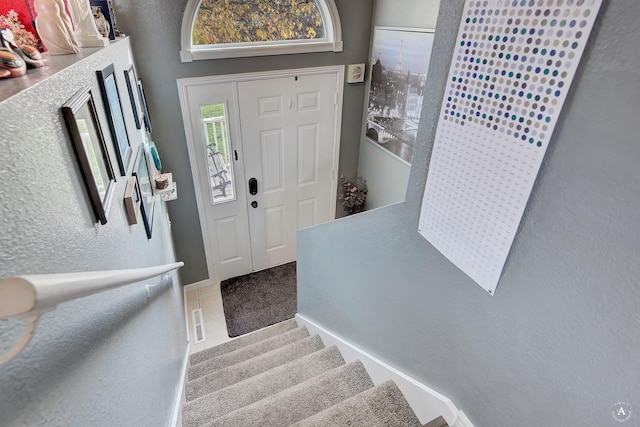 view of tiled foyer entrance