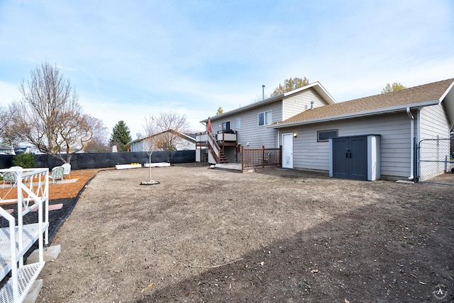 rear view of house with a deck