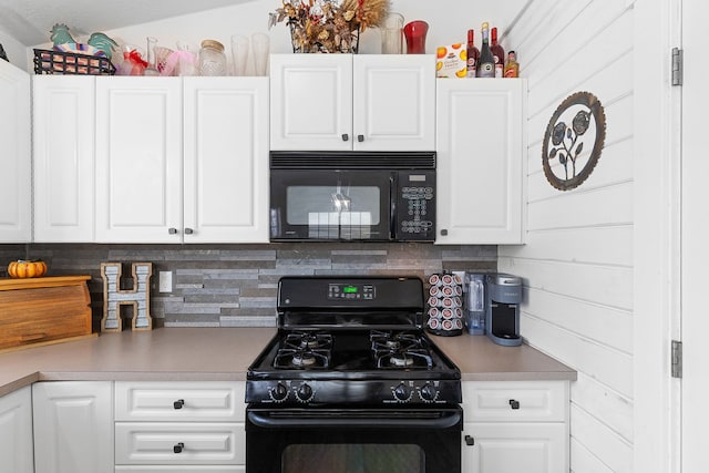 kitchen featuring light countertops, backsplash, white cabinetry, and black appliances