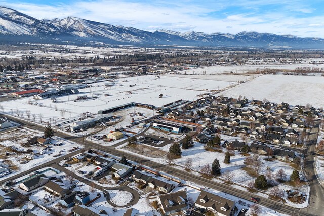 birds eye view of property with a residential view and a mountain view