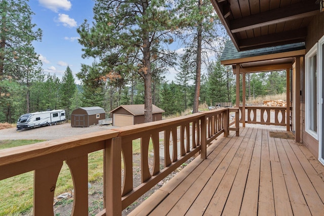 deck with a storage shed