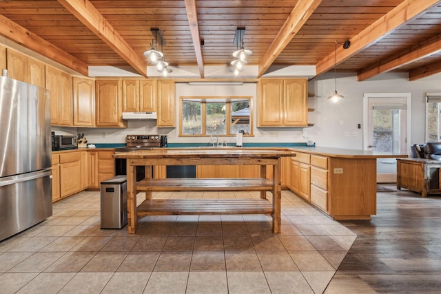 kitchen with appliances with stainless steel finishes, wooden ceiling, beam ceiling, and decorative light fixtures