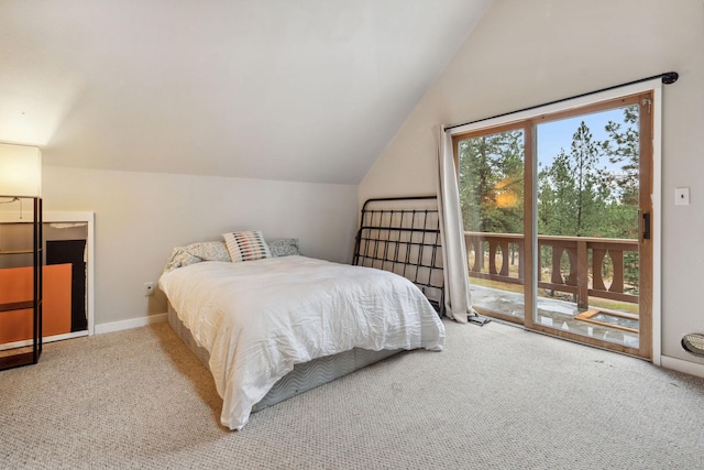 carpeted bedroom with access to outside and vaulted ceiling