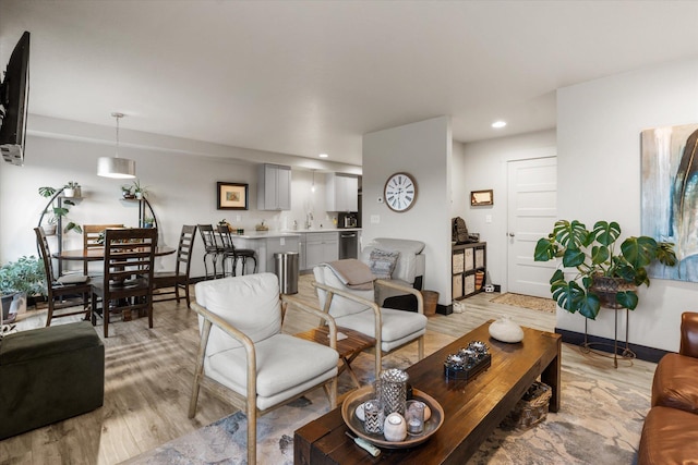 living room with light hardwood / wood-style floors