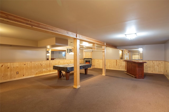 basement with pool table, bar area, and dark carpet