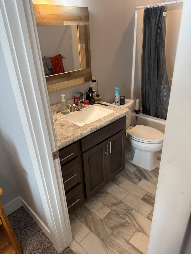 full bathroom with vanity, shower / bath combination with curtain, and toilet