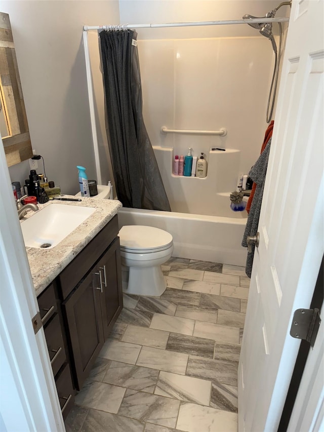 full bathroom featuring vanity, toilet, and shower / bath combo with shower curtain