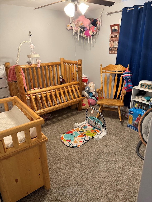 carpeted bedroom with ceiling fan