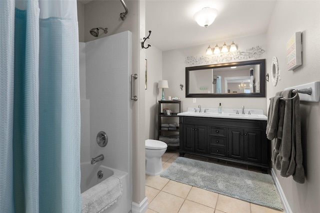 full bathroom featuring vanity, tile patterned floors, toilet, and shower / bath combo