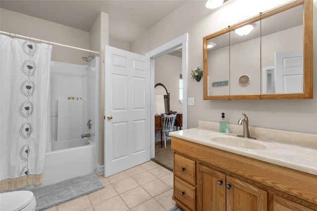 full bathroom with shower / tub combo with curtain, vanity, tile patterned floors, and toilet