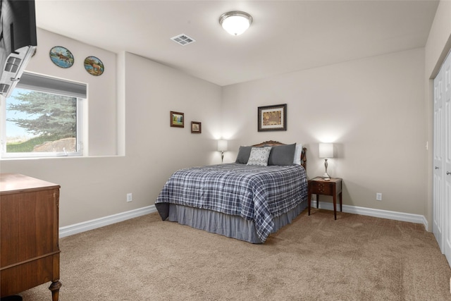 bedroom featuring a closet and carpet