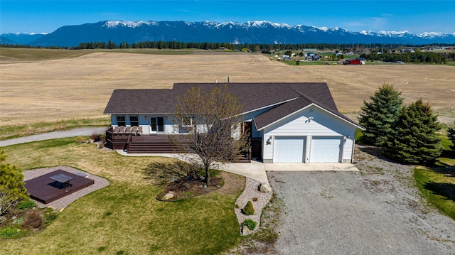 aerial view featuring a mountain view and a rural view