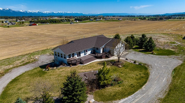 bird's eye view with a mountain view and a rural view