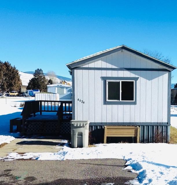 view of snow covered property