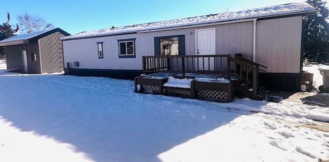 view of snow covered property