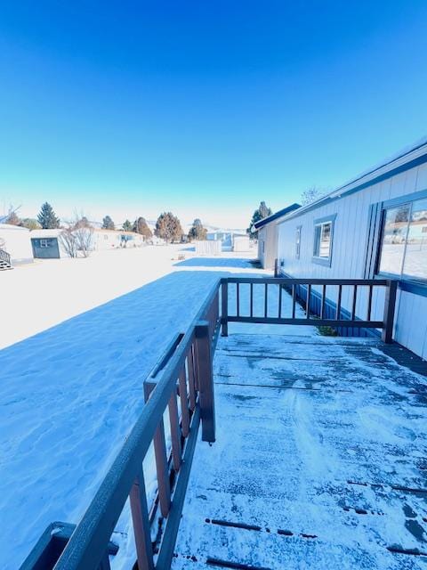 view of snow covered pool