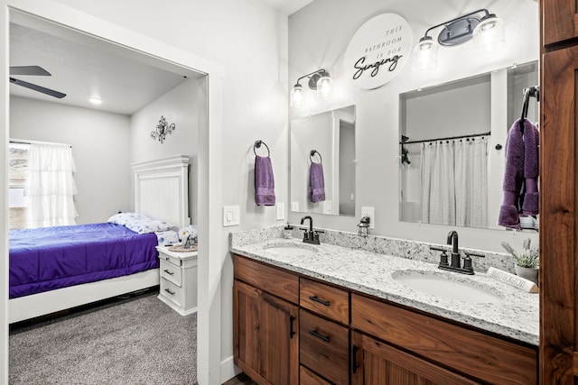 bathroom featuring vanity and ceiling fan