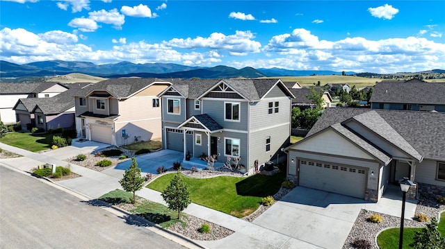 bird's eye view with a mountain view