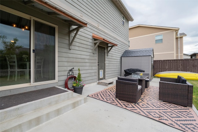 view of patio / terrace featuring a storage shed and an outdoor hangout area