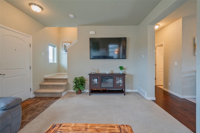 view of carpeted foyer