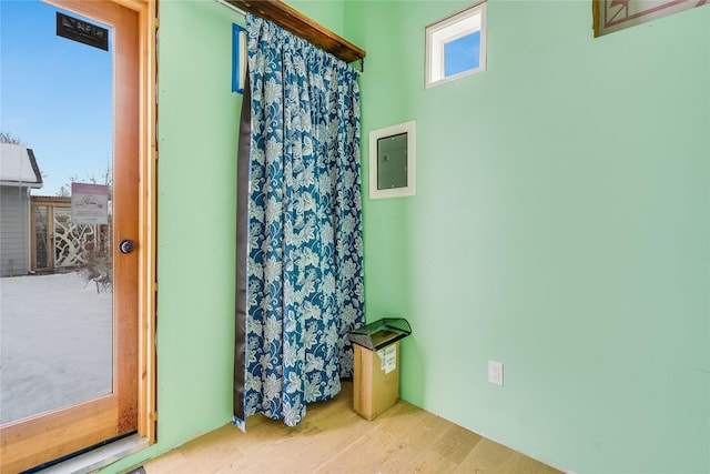 bathroom with hardwood / wood-style flooring