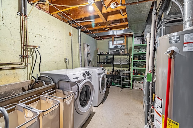 washroom featuring independent washer and dryer and gas water heater