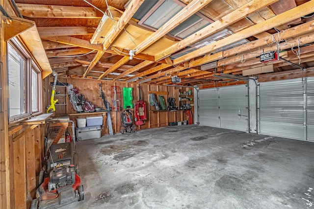 garage featuring a garage door opener