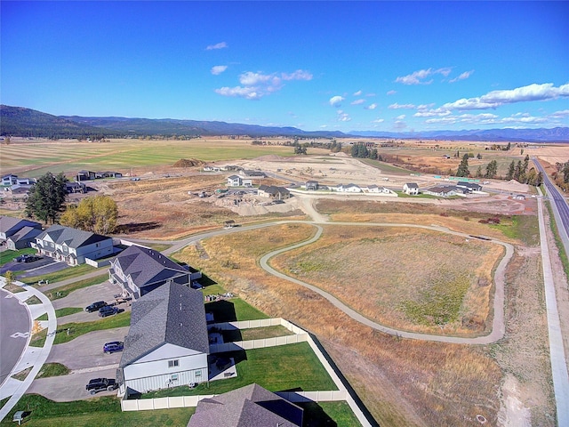 birds eye view of property featuring a rural view