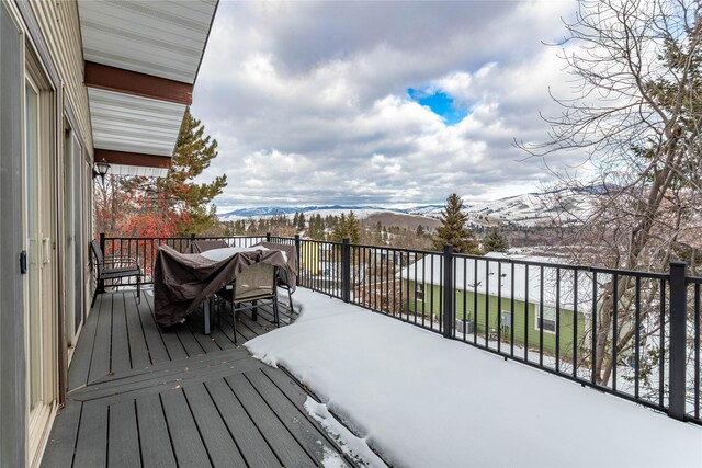 snow covered deck with ceiling fan