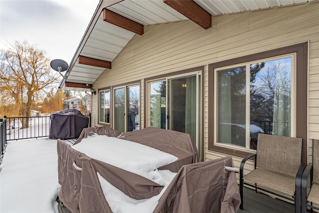 view of snow covered patio