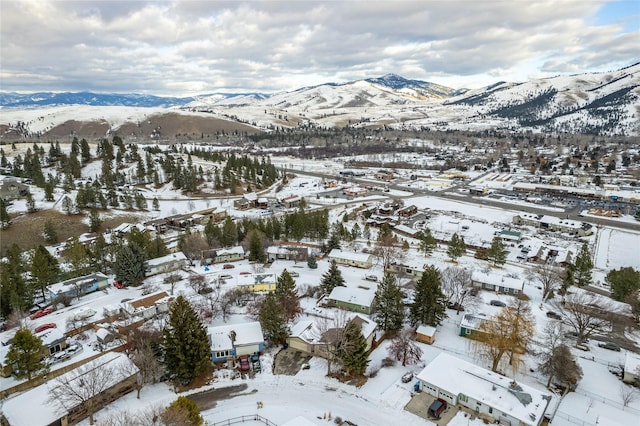 137 Cascade St, Lolo, MT 59847 - snowy aerial view with a mountain view and a residential view