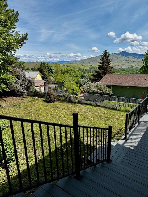 137 Cascade St, Lolo, MT 59847 - deck featuring a mountain view