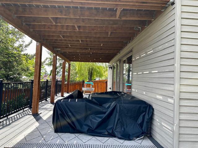 137 Cascade St, Lolo, MT 59847 - view of patio / terrace featuring a deck and fence